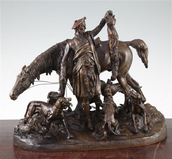 After P.J. Mene. A patinated bronze group of a Scottish hunter, The Kill, 14.5in.